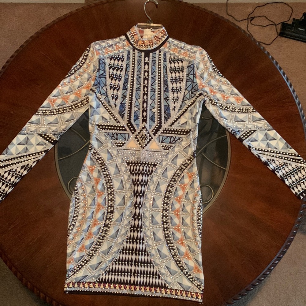 Long sleeve show stopper mini dress